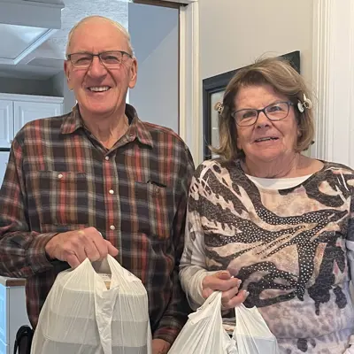 Seniors with a delivered meal