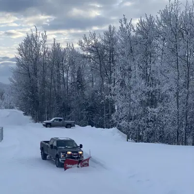 A truck removing snow
