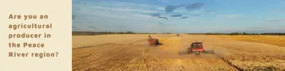 A rural field with harvesters advertising a call for volunteers to join the BC Agriculture Fund Committee